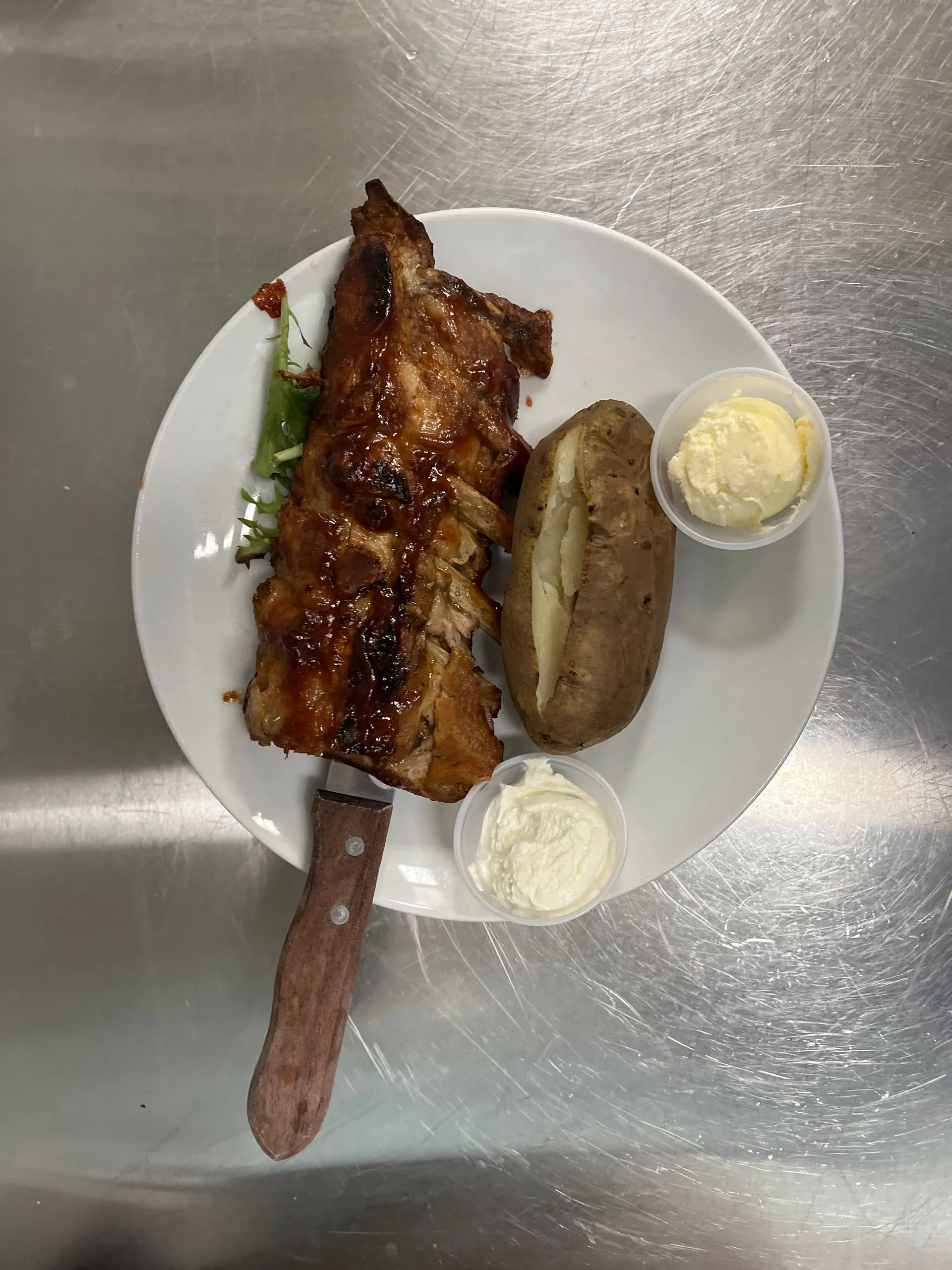 1/2 rack bar-b-q ribs on Holmes Beach baked potato hurricane hanks