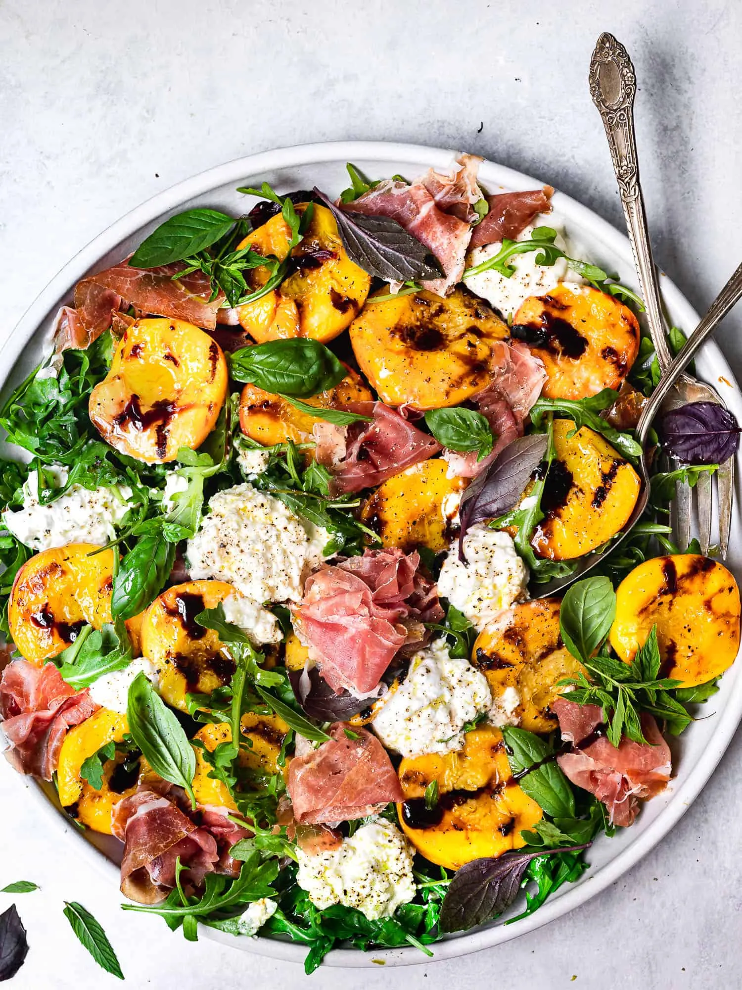 AMI’s Best Salad? Try Our Roasted Peach & Burrata Salad