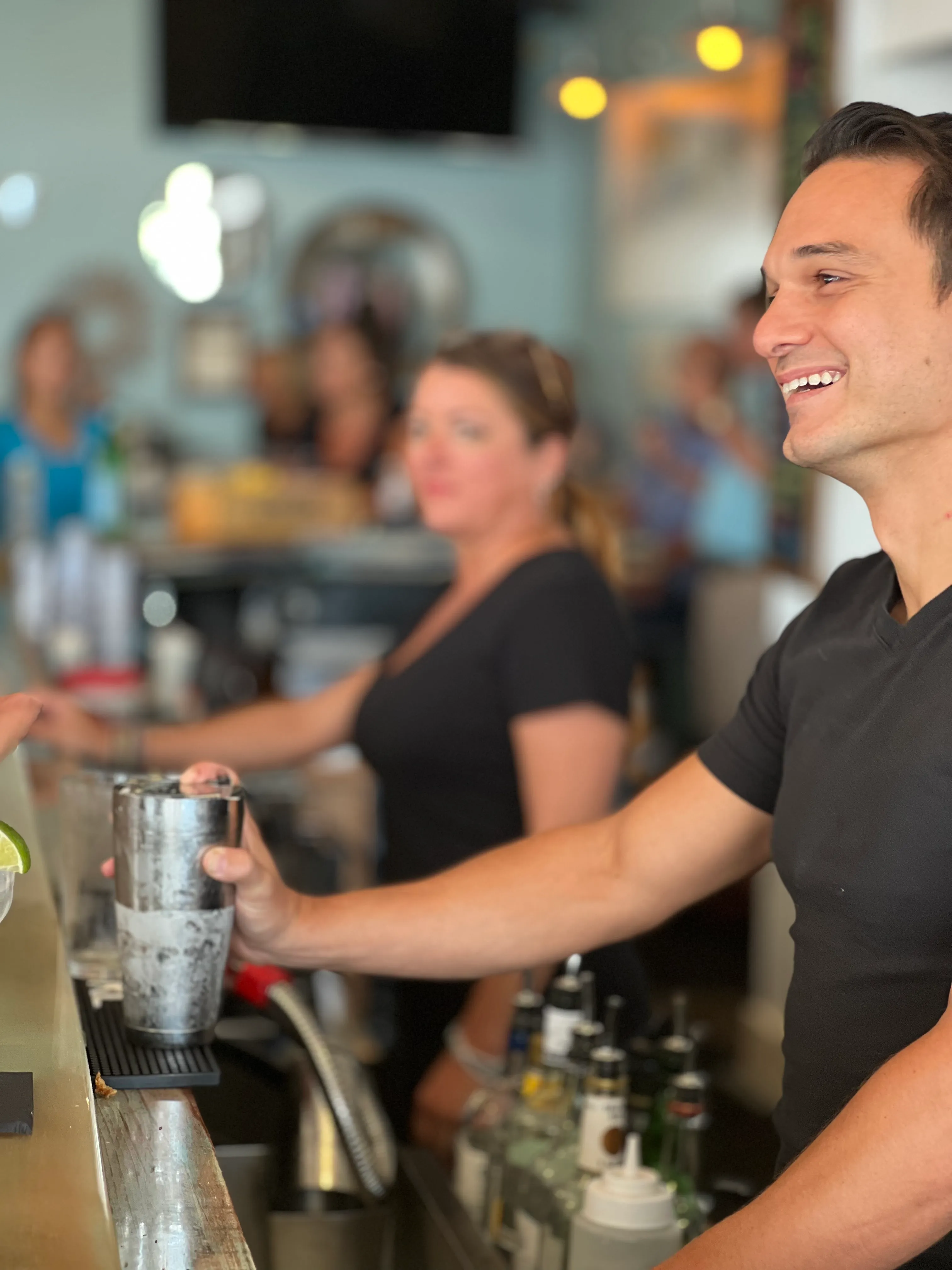 Hurricane Hanks Bartender Smiling Anna Maria nightlife